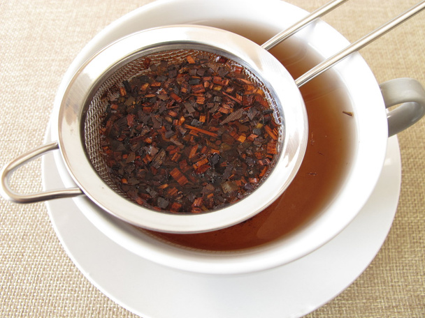 Honey bush tea in tea strainer - Photo, Image