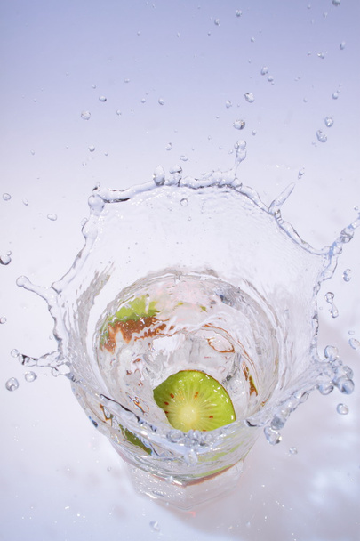 Fruit drop in water - Fotó, kép