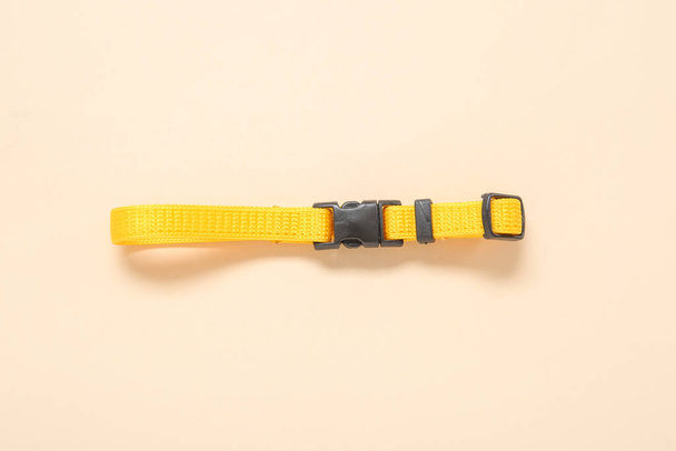 Yellow pet collar on color background - Φωτογραφία, εικόνα