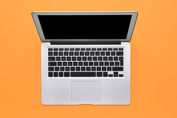 New modern laptop on color background - Фото, изображение