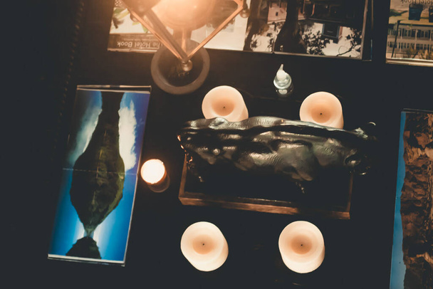 Top view of photos and candles in museum - Photo, Image