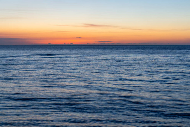 Sunset égbolt és a tenger - Fotó, kép