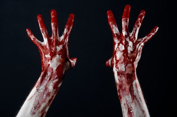 Bloody hands in white gloves, a scalpel, a nail, black background, zombie, demon, maniac - Foto, Imagem