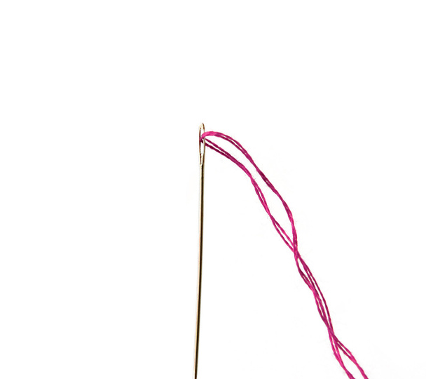Pink thread and needle isolated on white - Photo, Image