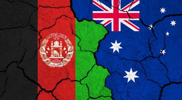 Flagi Afganistanu i Australii na pękniętej powierzchni - polityka, koncepcja relacji - Zdjęcie, obraz