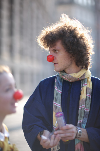 Profile of a clown in the street - Photo, Image