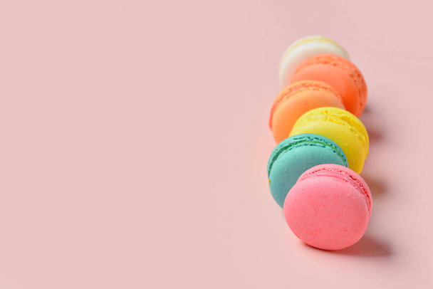 Sweet macaroons on pink background - Photo, Image