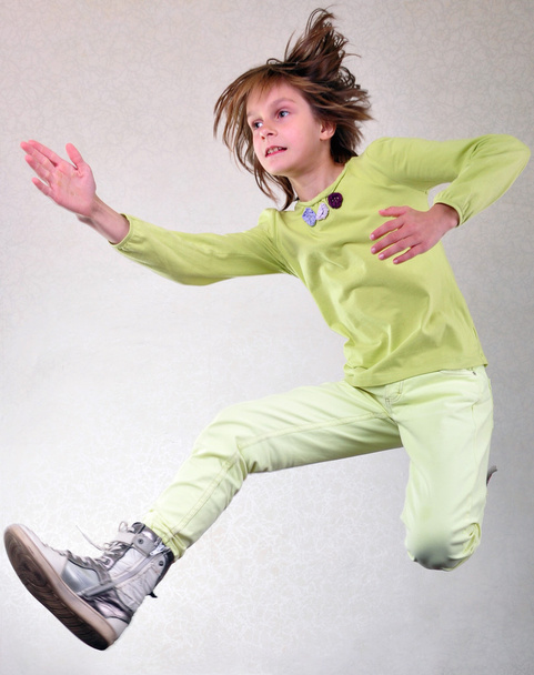 Portrait of child  jumping and dancing - Fotografie, Obrázek