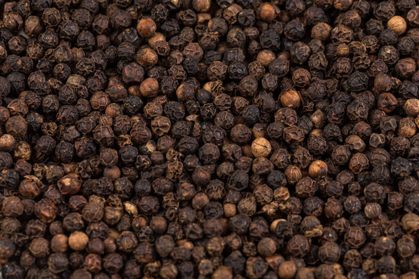 Black pepper zoomed in on and close up texture - Photo, Image