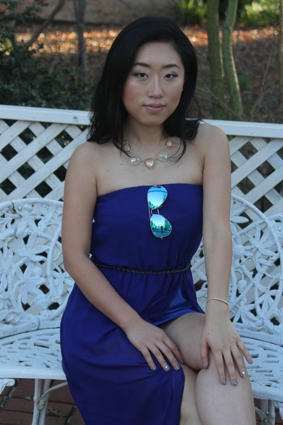 Pretty Chinese  girl in a blue dress - 写真・画像
