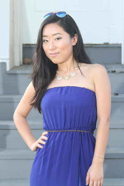 Pretty Chinese  girl in a blue dress - Foto, Imagen