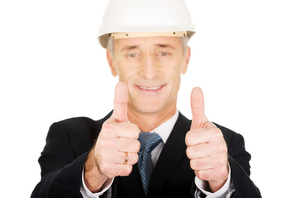 Construction businessman showing ok sign - Foto, Imagen