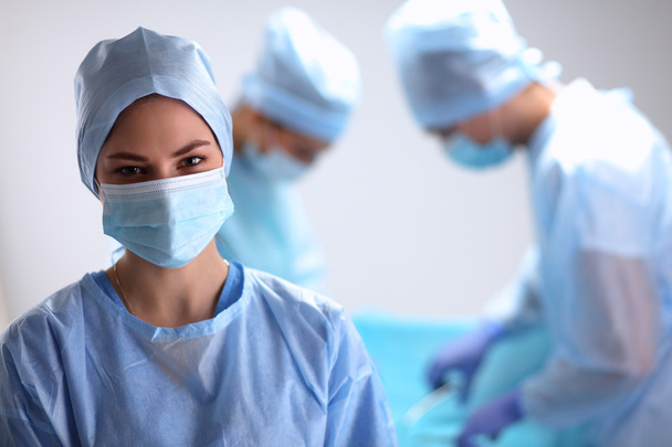 Team surgeon at work in operating room. - Фото, зображення