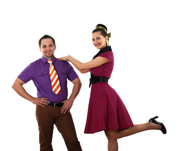 Young dancing couple in bright colour wear - Photo, Image