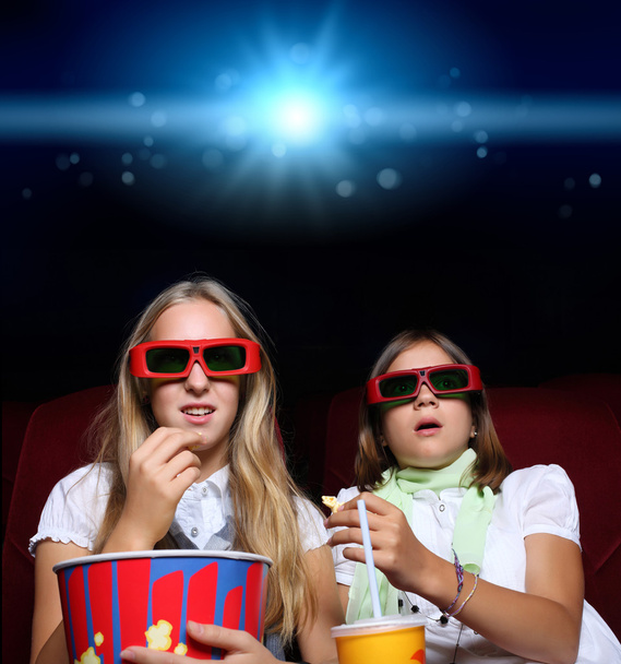 Two young girls in cinema - Fotoğraf, Görsel