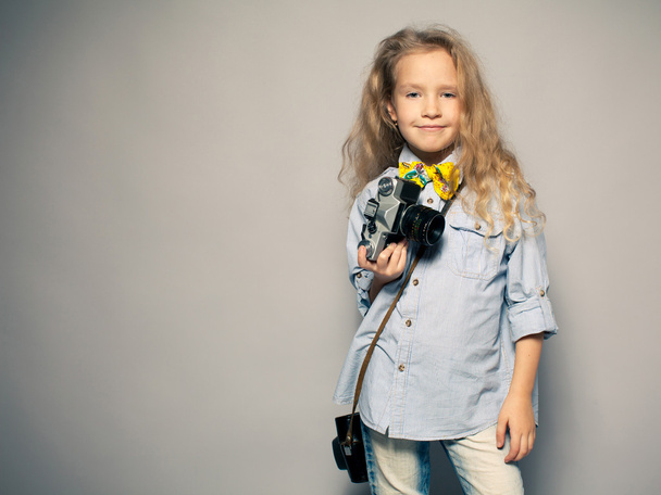 Child with camera. - Foto, Imagem