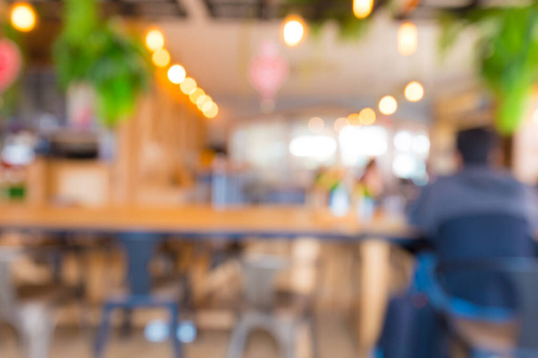 Abstraktní rozmazané kavárna restaurace s lidmi sedí v kavárně rozmazané bokeh - Fotografie, Obrázek