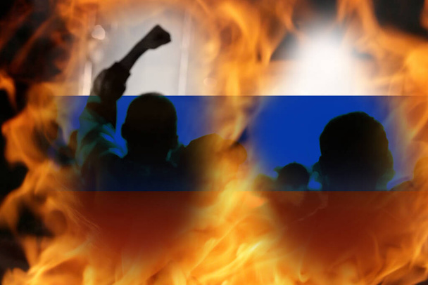 Civil war in Russia concept. PMK Wagner against the Russian army. Prigozhin against Putin. Flag. Protesters in moscow region. Fire and flame. - Photo, Image