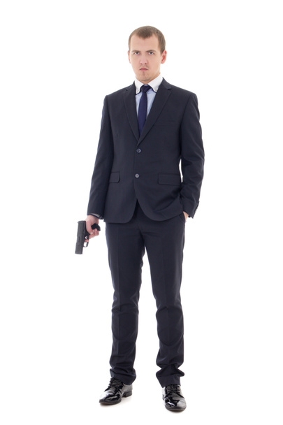pełnej długości piękny portret człowieka w garniturze z pistoletu na białym tle o - Zdjęcie, obraz