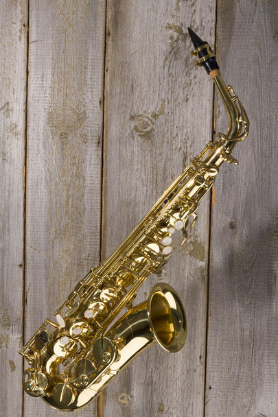 Gouden glanzende saxofoon - Foto, afbeelding