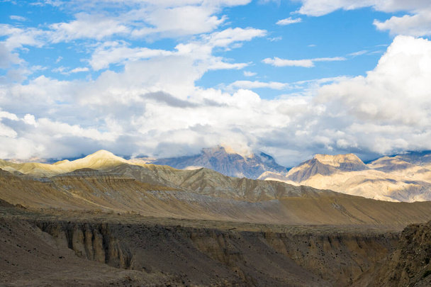 Beautiful Sunset in the Desert Canyon and Green Desert of Ghami Village in Upper Mustang, Nepal - Photo, Image