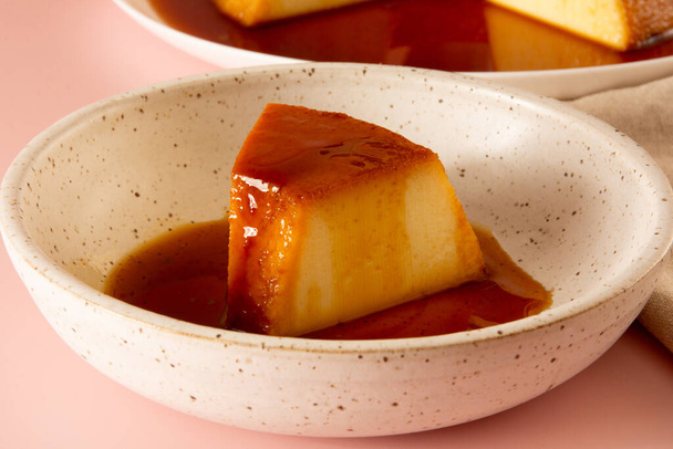 Creme Caramel Condensed Milk Pudim Slice with melting caramel in front view - Photo, Image
