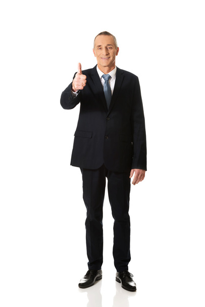 Businessman gesturing ok sign - Fotó, kép