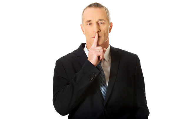 Businessman gesturing silent sign - Φωτογραφία, εικόνα