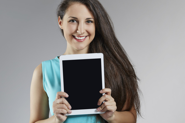 Beautiful young woman with digital tablet - Zdjęcie, obraz