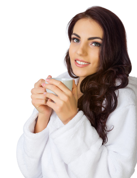 Young girl with bathrobe and cup - Foto, Imagem
