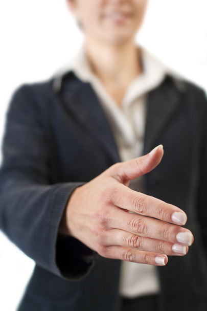 Businesswoman giving hand for handshake - Photo, Image