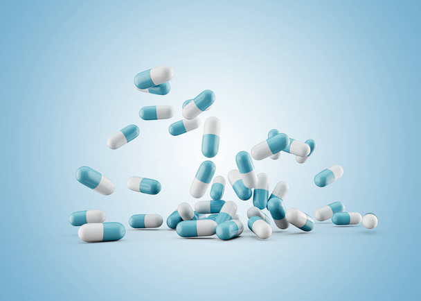 Capsules antibiotiques pharmaceutiques bleues et blanches 3d tombant sur fond bleu doux Illustration 3d - Photo, image