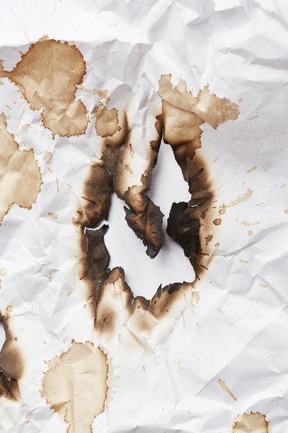 Burnt hole of paper - Фото, изображение