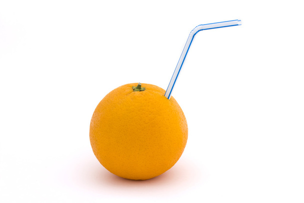 Orange with straw  over white. - Photo, Image