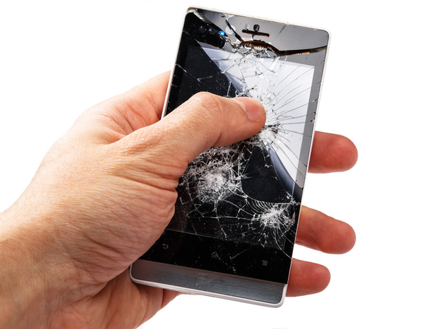 Smartphone with cracked display - 写真・画像