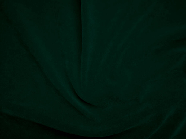 Green velvet fabric texture used as background. Emerald color panne fabric background of soft and smooth textile material. crushed velvet .luxury emerald tone for silk..	 - Fotó, kép