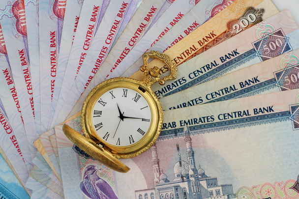 Дирхамы ОАЭ с золотыми антикварными часами
 - Фото, изображение
