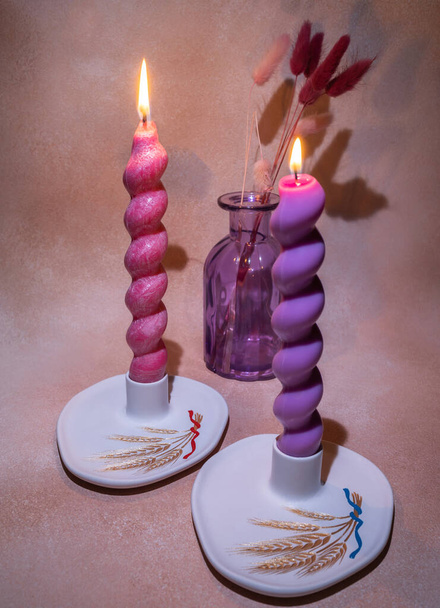 Still life with burning candles in candlestick holders - Photo, Image
