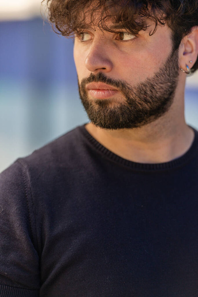 Close-up portrait of a bearded man looking sideways - Fotoğraf, Görsel