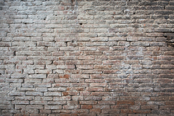 Старий старовинний гранжевий міська вулиця іржава цегляна стіна текстура фону
. - Фото, зображення