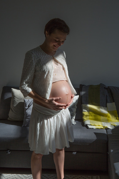 Nice and young woman pregnant - Φωτογραφία, εικόνα