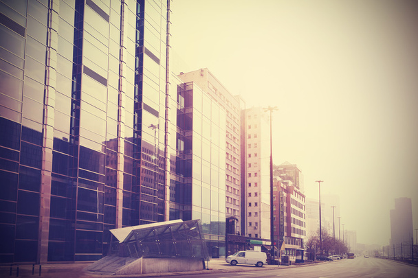 Vintage retro filtered picture of modern downtown. - Photo, Image