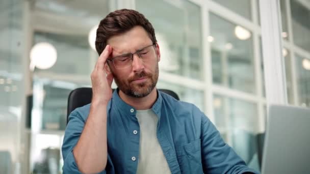 Exhausted employee struggling to finish work task worry at work health problems - Footage, Video