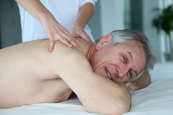 Senior man having a massage - Φωτογραφία, εικόνα