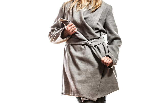 woman in elegant gray coat posing - Фото, изображение