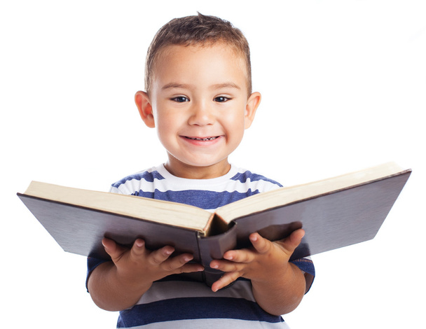 Kid holding book - Photo, Image