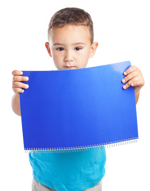 Boy with blue notebook - Φωτογραφία, εικόνα