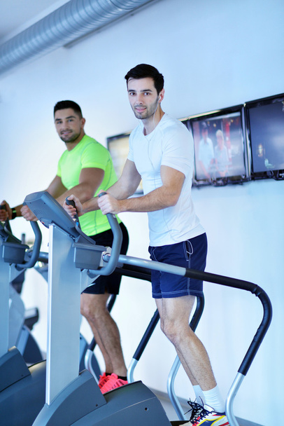 Men  running on treadmills - Фото, зображення
