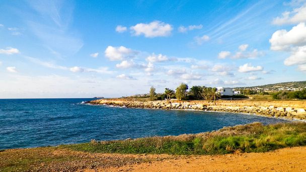 Coastal area on Cyprus, Asia. Mediterranean sea. Copy space on sky. - Fotografie, Obrázek