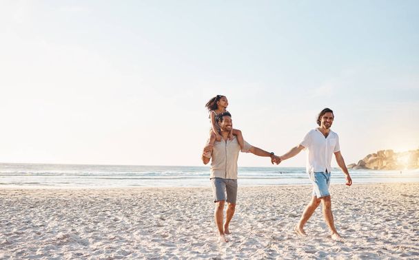 Lgbt parents on beach, men and child holding hands in summer, walking and island holiday together. Love, happiness and sun, gay couple on tropical ocean vacation with daughter on piggy back mockup - Photo, Image